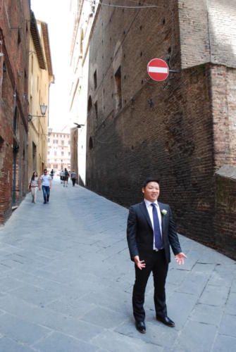 This was in Sienna. Norman pretending to be confused about the street signs and whether we were able to drive our Fiats into the plaza.